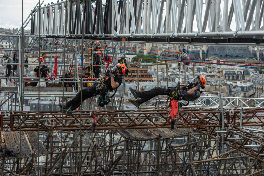 Notre Dame de Paris Specially trained rope access technicians rappelled into the structure