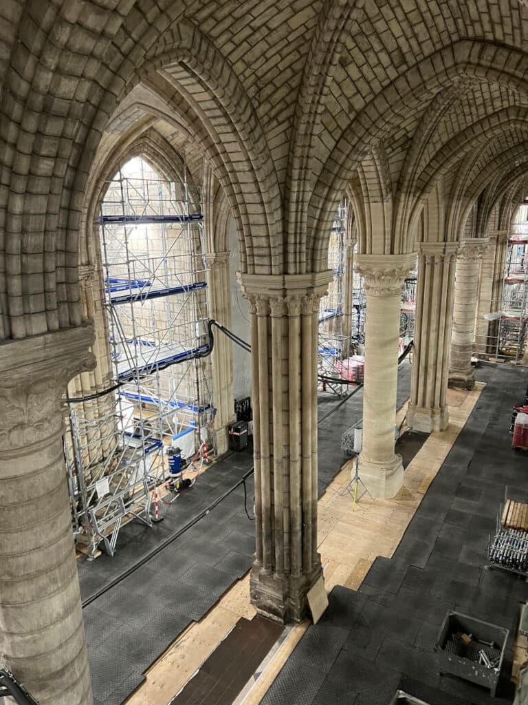 Notre Dame Cathedral Reconstruction Progress Update 2022 Photo. This picture shows the floor installation meant to support 600 ton, 100 meters high scaffolding that will help reconstruct the spire.